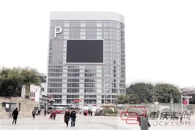 重庆首座智能立体停车楼试运行&nbsp;扫码自动存取车